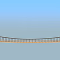 Modern Curved Bridge Structure With Metal Railings And Clear Blue Sky