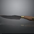Vintage Kitchen Knife With Wooden Handle And Golden Decorative Rivets Featuring Worn Blade Design