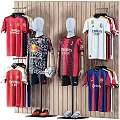 Different Football Team Jerseys Displayed On Mannequins And Hanging On Wooden Wall