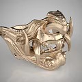 Golden Decorative Mask With Intricate Carvings And Tusk Details