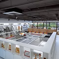 Industrial Workshop Interior With Workbenches Machinery Equipment And Display Screens