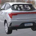 White Hyundai Sedan Car Displayed in Modern Showroom with Glass Walls