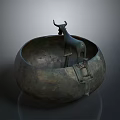 Ancient Bronze Vessel Featuring Intricate Bull Sculpture And Carved Details