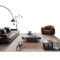 Black Leather Sofa Coffee Table Set with Armchair Floor Lamp Green Plant Footstool and Blanket