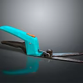 Useful Household Pruning Shears With Turquoise Handle Orange Button And Metal Blades