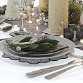 Elegant Dinnerware Set with Wine Glasses Candles and Decorative Balls for Festive Table Setting