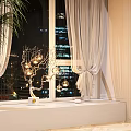 Elegant Golden Branch Decorative Light with Glass Balls by Window and Night City View