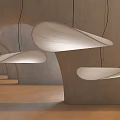 Modern Pendant Lights with Curved Sleek Design Hanging in Contemporary Interior Space
