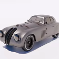 Vintage Silver Classic Car Featuring Streamlined Body Vintage Tires And Elegant Styling