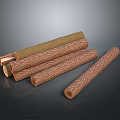 Several Brown Wooden Sticks With Textured Surface And Smooth Finish On Dark Background