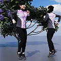 Women in Purple and Gray Sportswear Exercising by Purple Flowering Tree Under Blue Sky