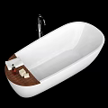 White Oval Bathtub With Silver Faucet And Wooden Tray Holding Essential Oil And Soap Bars