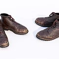 Vintage Brown Leather Lace Up Boots With Distressed Finish And Classic Style