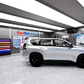 SunRise 4S Showroom Featuring White SUV On Display With Bright Lights And Surrounding Posters