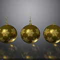 Golden Christmas Ornaments With Snowflake Patterns And Hooks On Gray Background