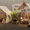 Garden Landscape Featuring Tents String Lights Wooden Fence Plants And Fire Pit