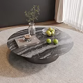 Round Black Marble Coffee Table Featuring Clear Vase Green Plant Glass Bowl Green Apples Book
