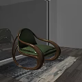 Elegant Curved Wooden Leisure Rocking Chair With Comfortable Green Cushion In Bright Seaside Living Space