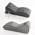 Modern Curved Lounge Chair With White Gray Upholstery And Side Table Decor