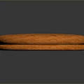 Orange Round Dessert Cake Sliced Into Sections With Textured Surface And Smooth Edges