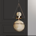 Modern Golden Double Sphere Chandelier with Moon Surface Texture on Dark Wall Background