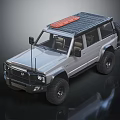 Silver Off Road Vehicle With Red Roof Rack And Large Off Road Tires