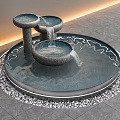 Garden Ornament Water Feature With Flowing Bowl Shapes Circular Pool Pebble Trim And Warm Lighting