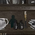 Decorative Set With Green Human Shaped Ornament Two Black Jars Numbers 2 And 9