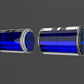 Two Transparent Drum Shaped Playground Equipment With Blue Stripes And Silver Frames