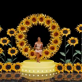 Floral Installation With Circular Sunflower Arrangement Platform And Woman In Pink Dress On Black Background