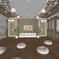 Chinese Style Indoor Yoga Practice Space With Wooden Decor Pink Cushions And Green Plants