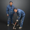 Two Men In Blue Work Uniforms Standing And Bending To Use Tool On Floor