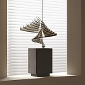 Modern Spiral Metal Blade Sculpture On Gray Cube Base By Bright Window Blinds