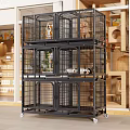 Three Tiered Black Metal Pet Cage with Pets Inside in Pet Store Display Setting