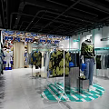 Modern Clothing Store Interior With Various Clothing Displays And Racks