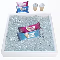 Blue and Pink Ice Cream Packets in Clear Ice Cubes on White Tray