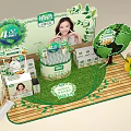 Commercial Display Equipment For Lactic Acid Bacteria Drinks With Green Decorations And Tree Shaped Structure