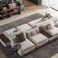 Modern Beige Upholstered Sectional Sofa With Pillows On Gray Rug Wooden Floor