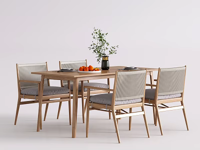 Wooden Dining Table With Four Chairs Plant In Vase And Oranges On Tabletop 3d model
