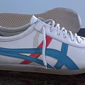 White Shoes With Blue And Red Stripes White Laces Brown Textured Sole With Grid Pattern