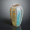 Decorative Vase With Yellow Floral Patterns Green Leaves And Blue Geometric Designs