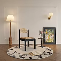 Elegant Dining Chair With Wicker Seat Black Frame Round Rug Floor Lamp And Wall Sconce