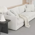 Light Beige Two seater Sofa with Cushions Throw Blanket and Black Side Table Lamp