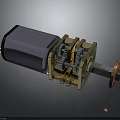 Mechanical Gear Motor Mechanism with Silver Cylindrical Housing Golden Gear Components and Red Connector