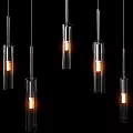 Modern Glass Tube Pendant Lights with Multiple Lit Bulbs on Dark Background