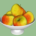 White Ceramic Bowls With Pedestal Base Filled With Red And Yellow Apples