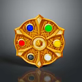 Golden Circular Magic Weapon Featuring Six Colored Gems Blue Green Red Yellow Black White