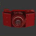 Vintage Kodak Camera With Red And Black Body Classic Lens And Control Knobs 3d model