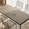 Modern Wooden Dining Table Set with Four Metal Frame Chairs and Glass on Table