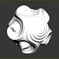 Intricate Abstract Silver Metallic Sculpture With Curved Surfaces And Reflective Design